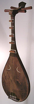Japanese Biwa, the “Sawari” is produced from the wide frets. Japanese Biwa, the “Sawari” is produced from the wide frets.